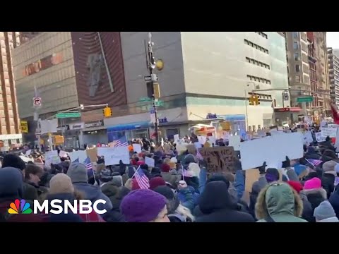 Protestors chant "No one voted for Elon Musk" as federal layoffs begin