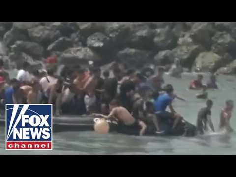 BREAKING: Migrants storm city border as national emergency requested